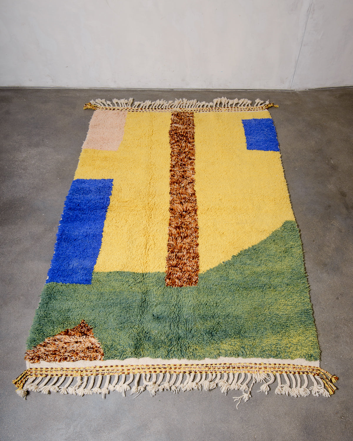 Modern, designer, handcrafted Berber rug from Morocco. Beniourain carpet with beautiful colours and patterns and fluffy wool texture.